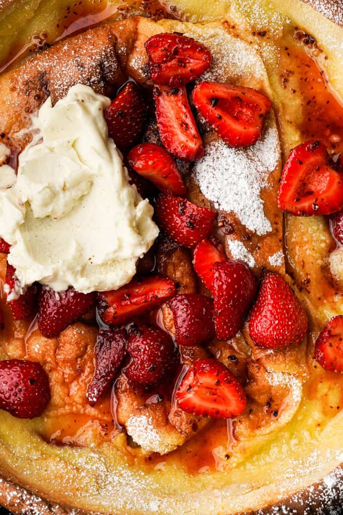 close up view of strawberry toppings for dutch baby recipe