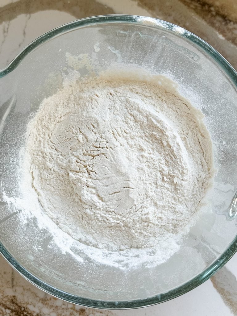 flour, salt, vanilla, butter and eggs added to the ingredients
