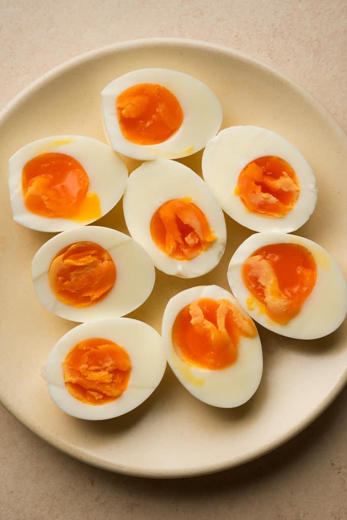 plate of boiled eggs with jammy centers