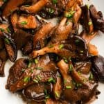 close up view of plated sauteed mushrooms