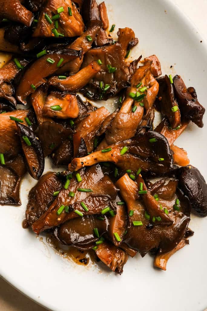 close up view of plated sauteed mushrooms